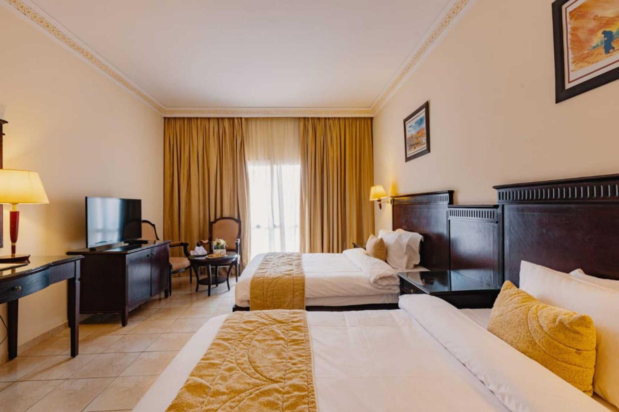 Grand Mogador Agdal & Spa Marrákes Kültér fotó A room at the hotel
